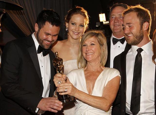 Best actress Oscar winner Jennifer Lawrence poses with her family at the Governors Ball for the 85th Academy Awards in Hollywood