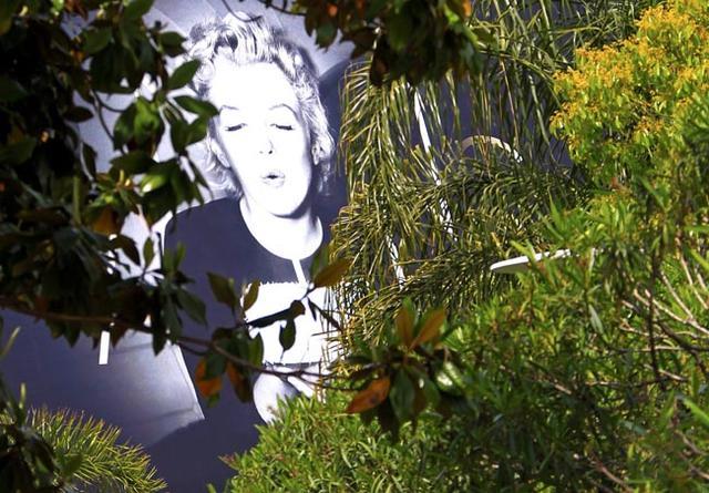 A giant canvas of the official poster of the 65th Cannes Film Festival featuring U.S. actress Marilyn Monroe is seen on the facade of the Festival Palace in Cannes
