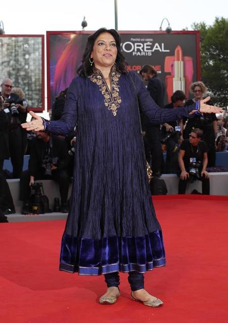 Indian film director Nair poses on the red carpet of her movie "The Reluctant Fundamentalist" at the 69th Venice Film Festival