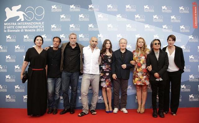 Members of the jury of the 69th Venice Film Festival Abramovic, Garrone, Folman, Trapero, Casta, Mann, Morton, Chan and Meier pose during a photocall in Venice